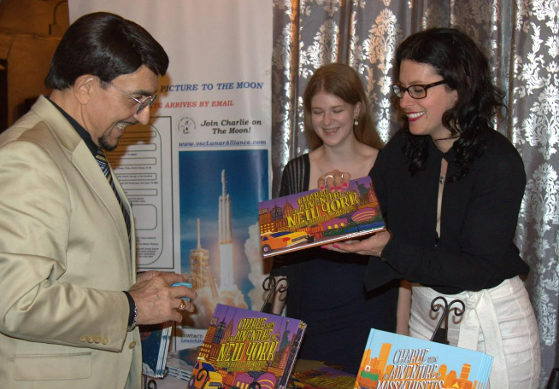 Opera Music Celebrity Dr. Andrea Garofalo buying a book from Haley Marguerite - Charlie goes to Massachussetts