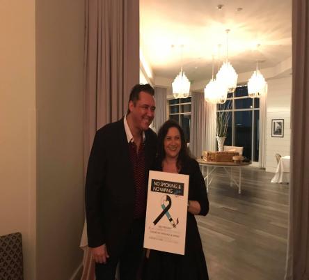 Jay Shapiro in background and Leah Olstein on the microphone at Ritz Carlton Bal Harbour representing Never Start at Celebrity Fest 2019